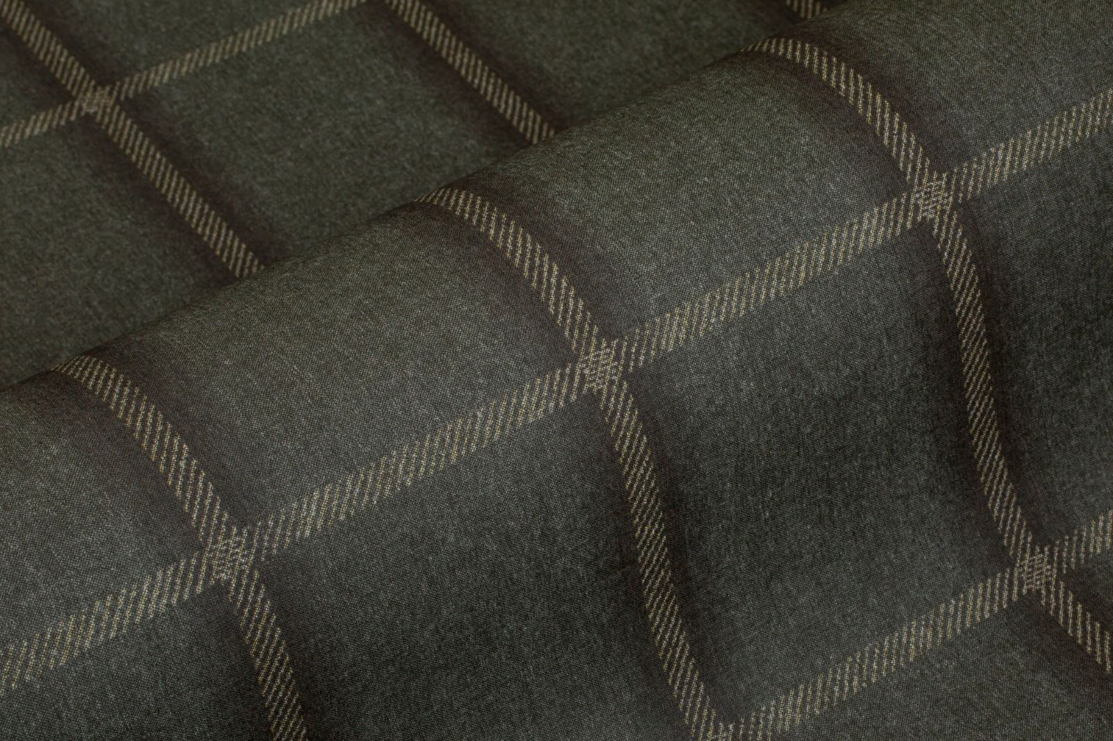 Simply timeless! A clever, traditional plaid enriched with layers of woven texture.